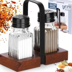 Salt- och pepparkar med stativ, 3 stycken.